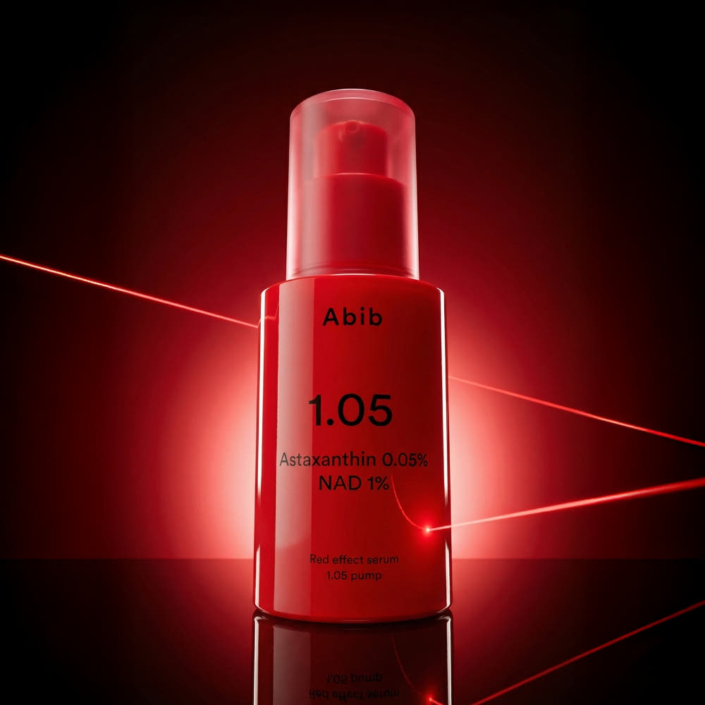 ABIB Red Effect Serum 1.05 Pump 30ml par Abib, flacon rouge sur fond sombre avec reflets lumineux.
