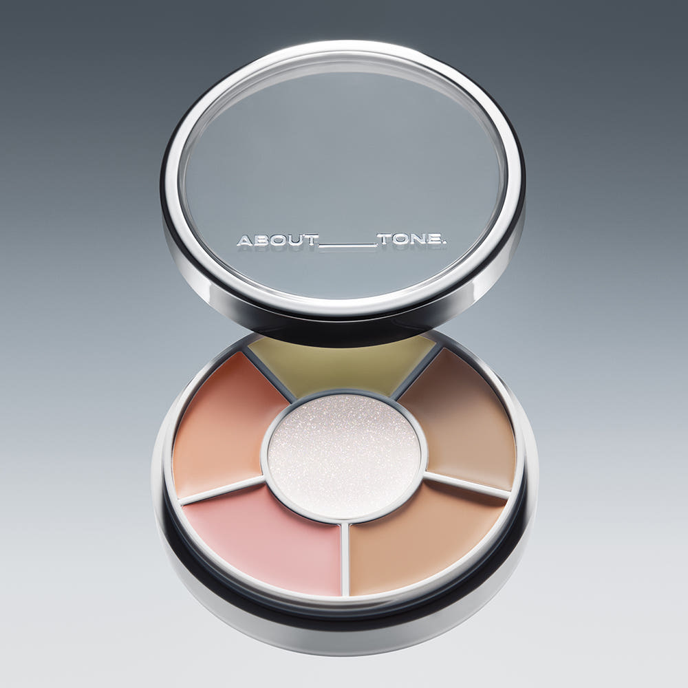 Palette de maquillage "ABOUT TONE Designing Multi Palette 6.5g", couleurs variées, design élégant, produit cosmétique.