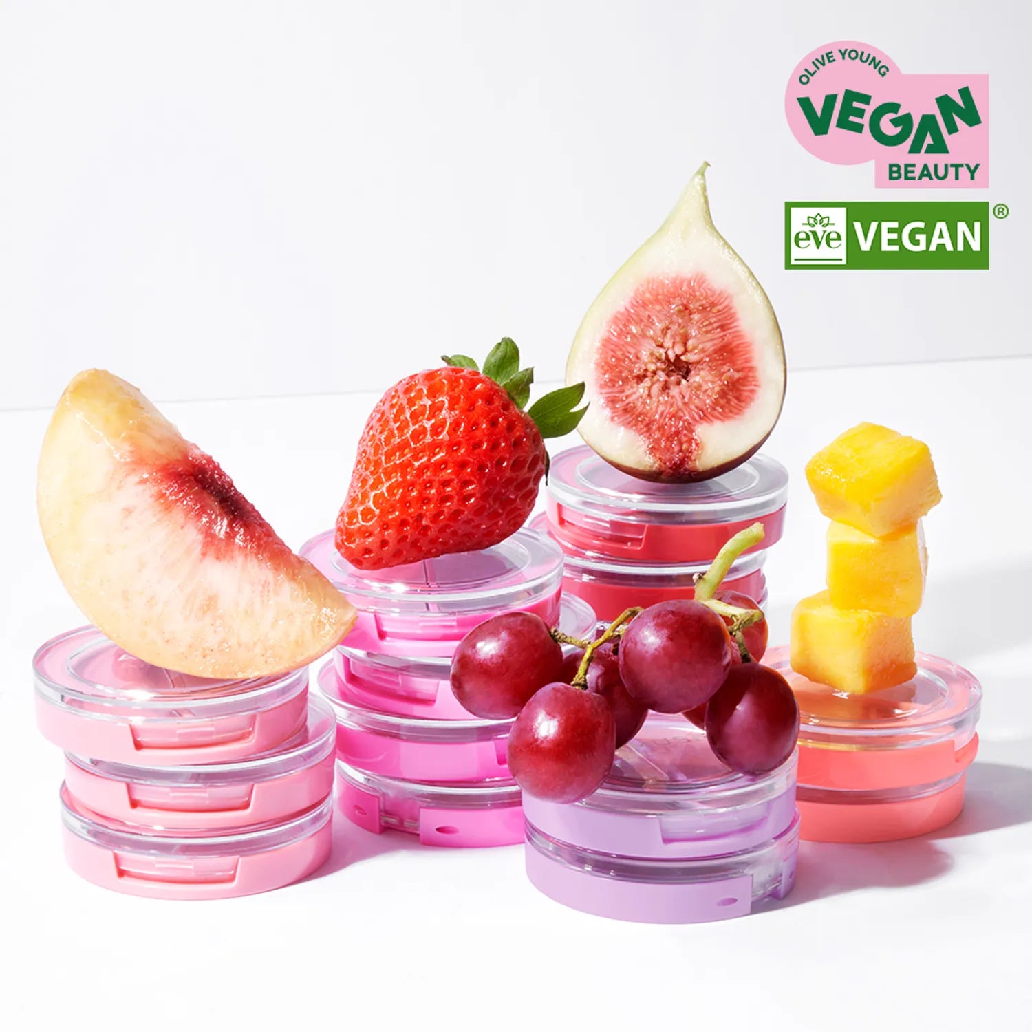 AMUSE Lip & Cheek Healthy Balm : baumes rosés sur fond blanc avec fruits (fraise, figue, raisin, mangue), marque AMUSE