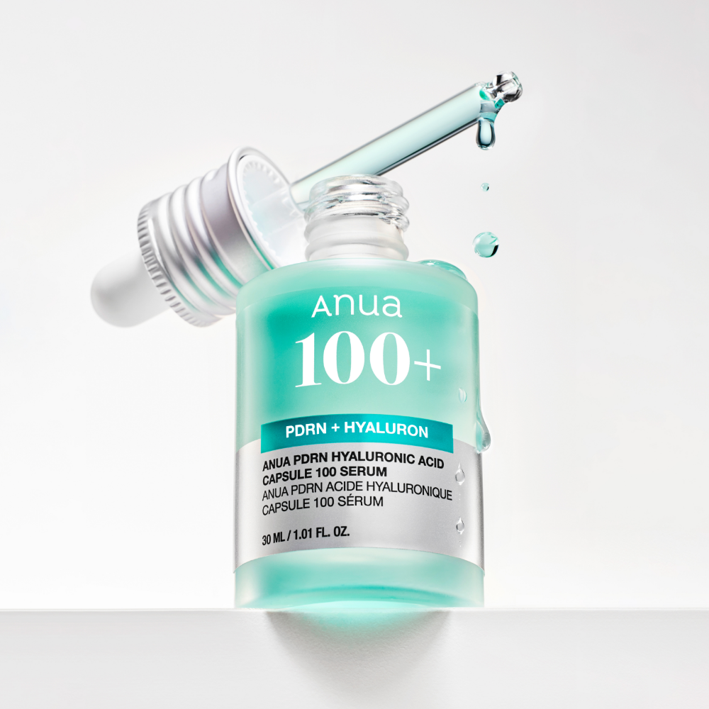 ANUA PDRN + Hyaluronic Acid Capsule 100 Serum 30ml, flacon ANUA avec éclaboussures d’eau, fond blanc.