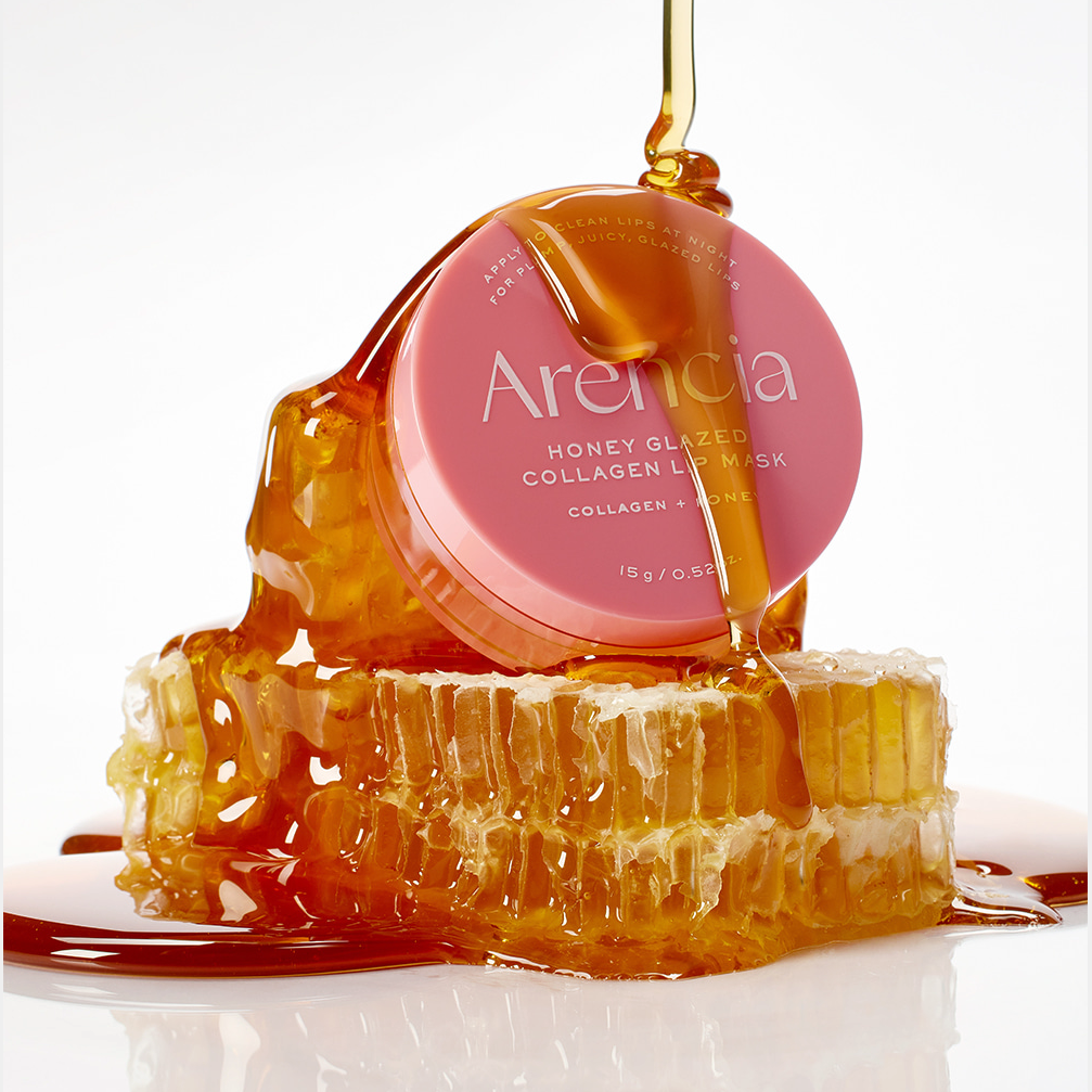 ARENCIA Honey Glazed Collagen Lip Mask 15g, pot rose avec miel doré sur fond blanc, texture glossy.