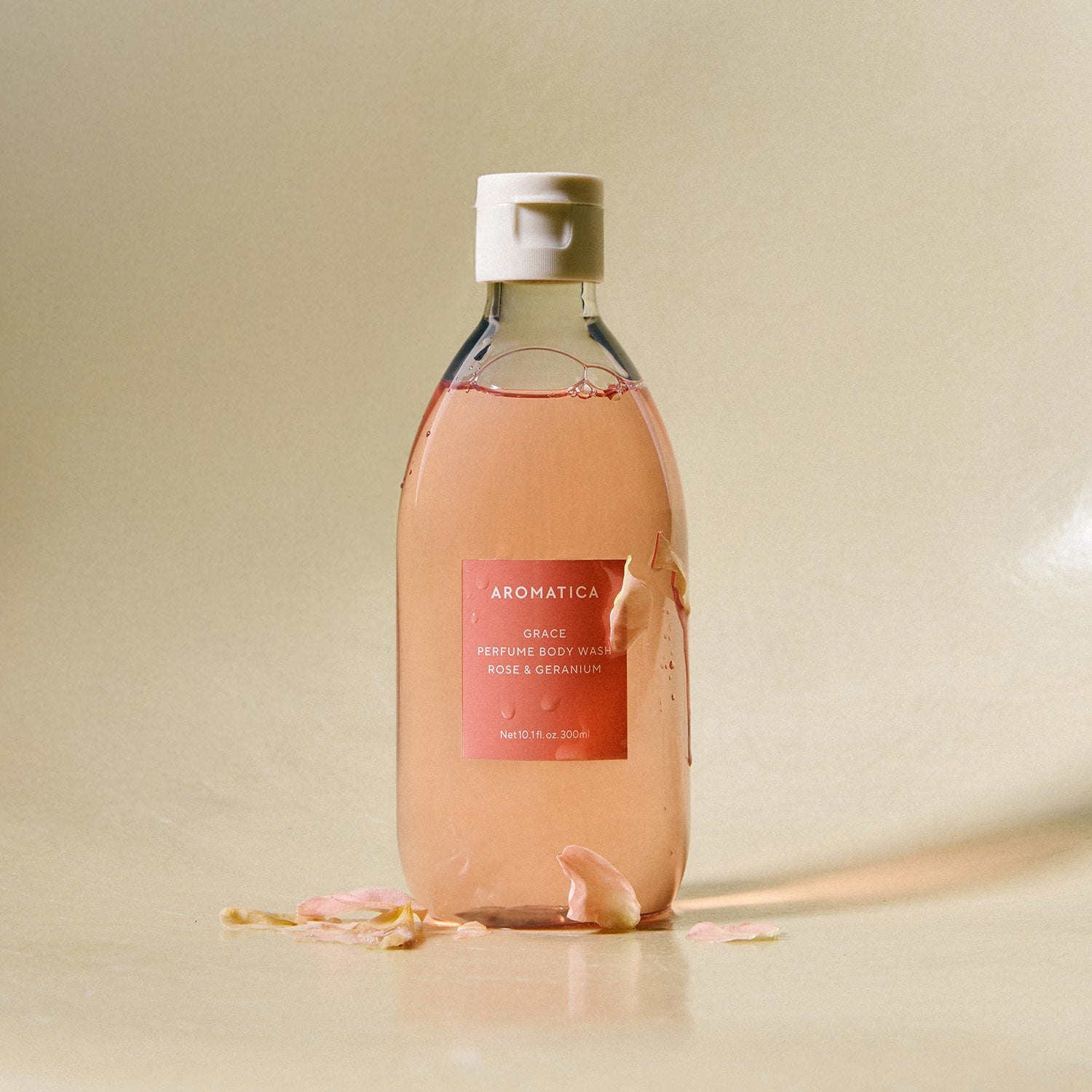 AROMATICA Grace Perfume Body Lotion Rose & Geranium 300ML, flacon rose-géranium sur fond clair, marque AROMATICA.