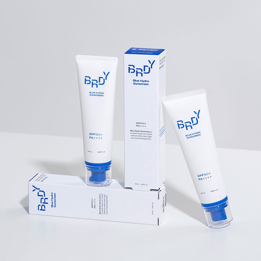 BE.READY Blue Moisture Sun Cream SPF50+/PA++++ 50ml, crème solaire protectrice, hydratante, SPF50+, emballage bleu et blanc.