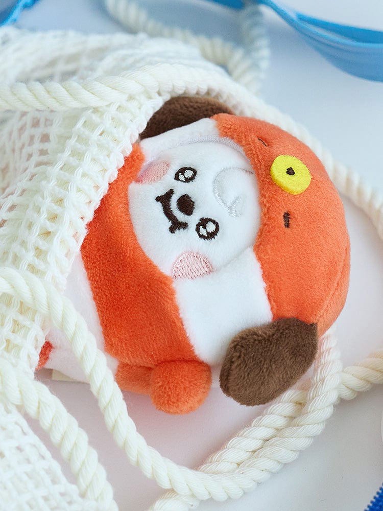 BT21 CHIMMY BABY MINI DOLL OCEAN FRIENDS, peluche officielle Jimin BTS sur tissu blanc, ambiance océan bleu