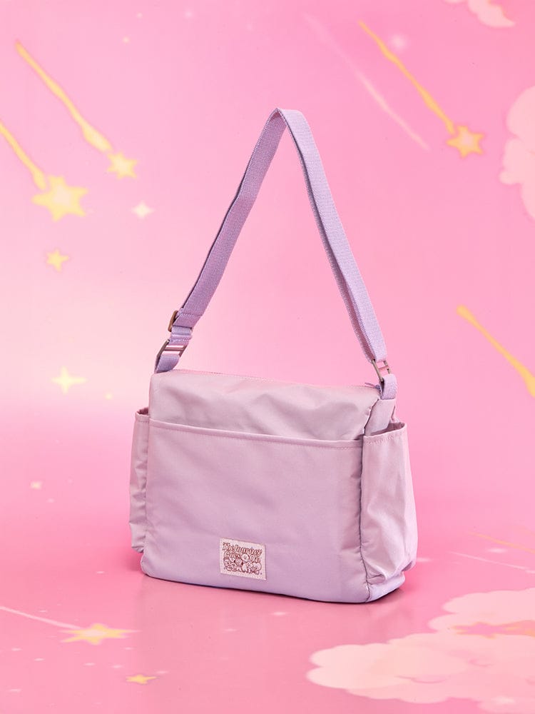 BT21 CLEAR POCKET MULTI CROSSBODY BAG THE JOURNEY, sac bandoulière lilas sur fond rose étoilé, brand BT21/LINE FRIENDS.