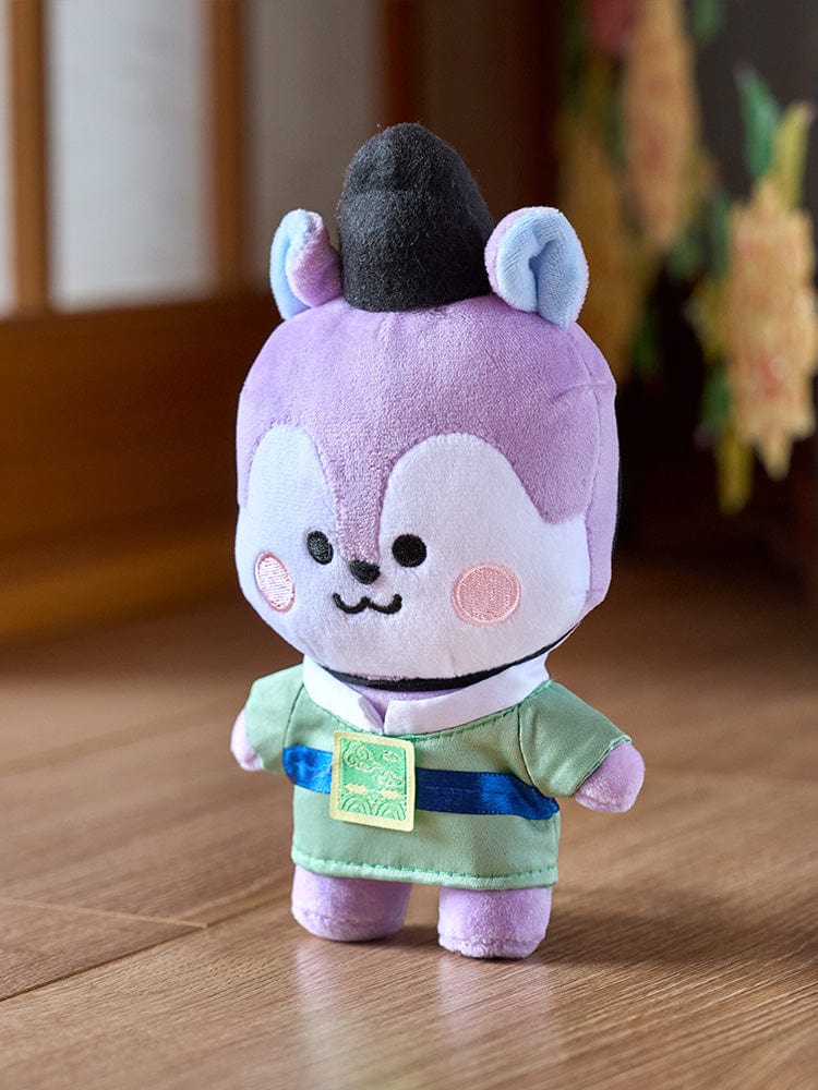 BT21 MANG BABY PLUSH DOLL K-EDITION 2 : peluche officielle violette MANG, sur table, chambre style K-EDITION.