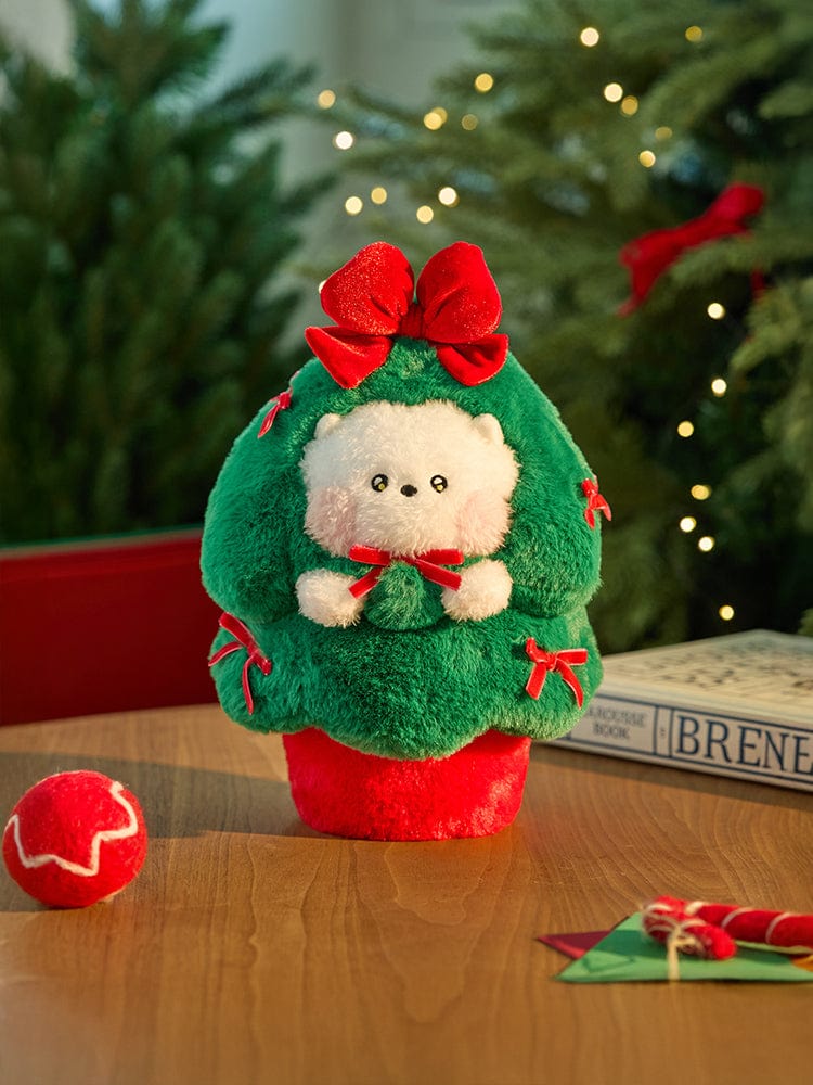 BT21 RJ minini TREE PLUSH PETITE HOLIDAY : peluche RJ alpaga, déco de Noël, sur table près du sapin, marque BT21.