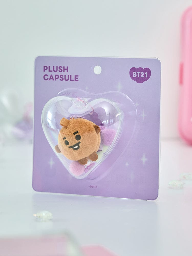 BT21 SHOOKY BABY PEARL PLUSH KEYRING : porte-clés peluche SHOOKY en forme de biscuit sur carte LINE FRIENDS, fond pastel.
