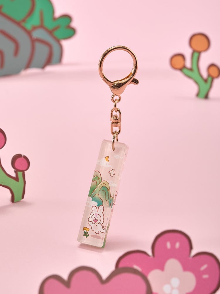 BT21 STICK ACRYLIC KEYRING K-TOKKI, porte-clés acrylique officiel LINE FRIENDS, fond rose avec personnages BT21.