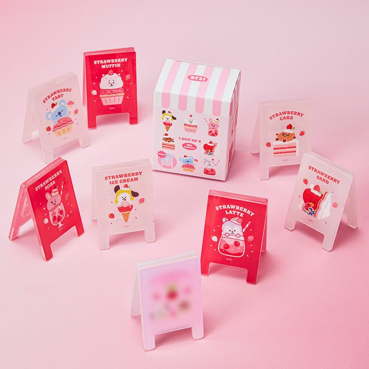 BT21 Strawberry Party Random Acrylic Multi Clip (1 Piece) de la marque BT21, clips acryliques sur fond rose pastel.