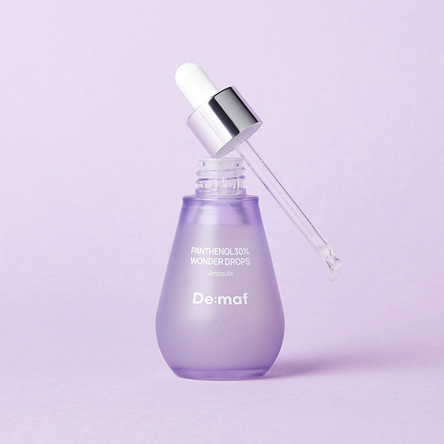 DE:MAF Panthenol 30% Wonder Drops 55ml, flacon mauve et pipette sur fond clair, produit Dé:maf.