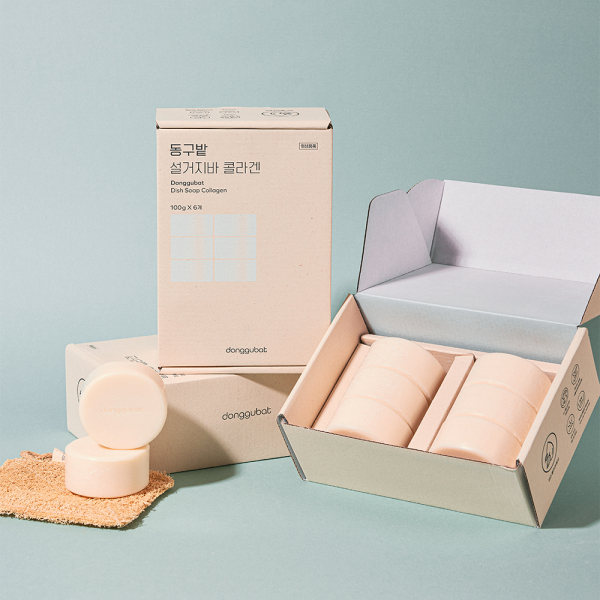 DONGGUBAT Soljiba Collagen 600g, boîte et pots sur fond bleu, marque DONGGUBAT, style produit en studio.