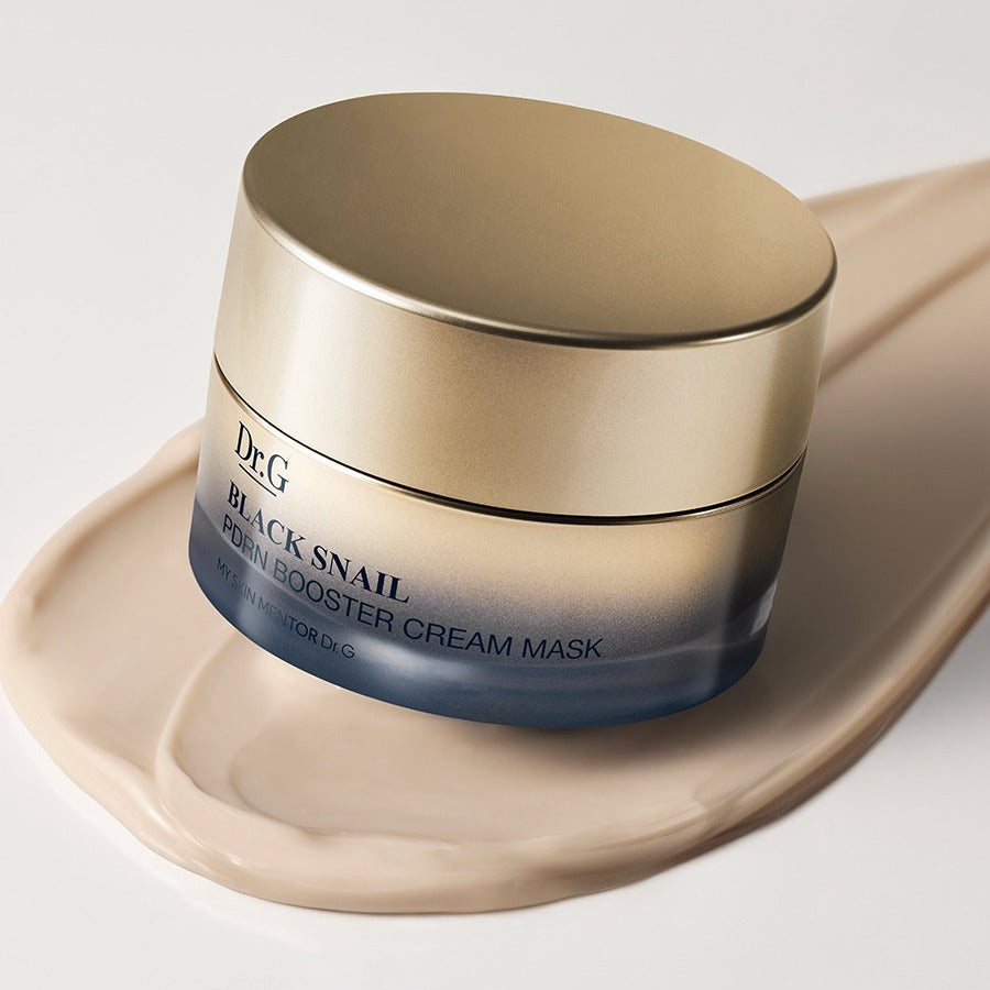 Dr. G Black Snail PDRN Booster Cream Mask 50mL sur fond crème, soin visage luxueux, hydratation et régénération de la peau.