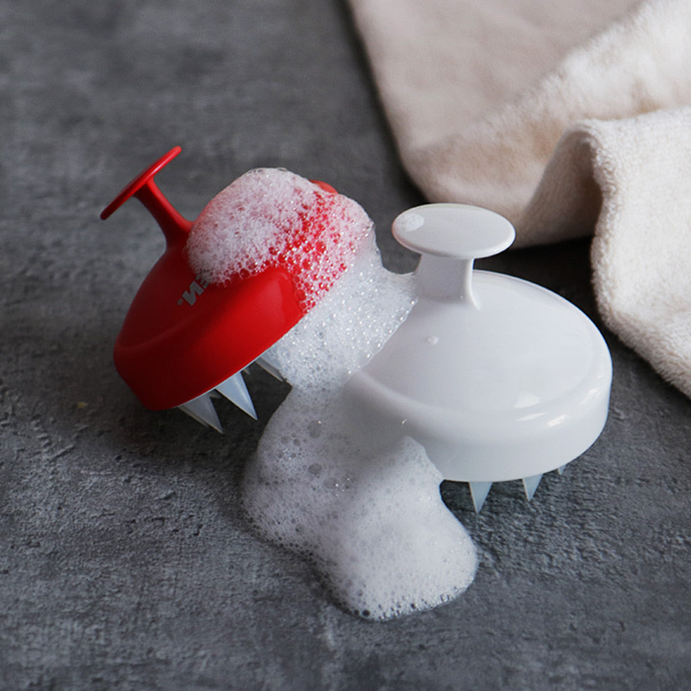 GRAFEN Edge Finger, embout rouge et blanc sur tissu gris et serviette, gros plan nettoyage après usage