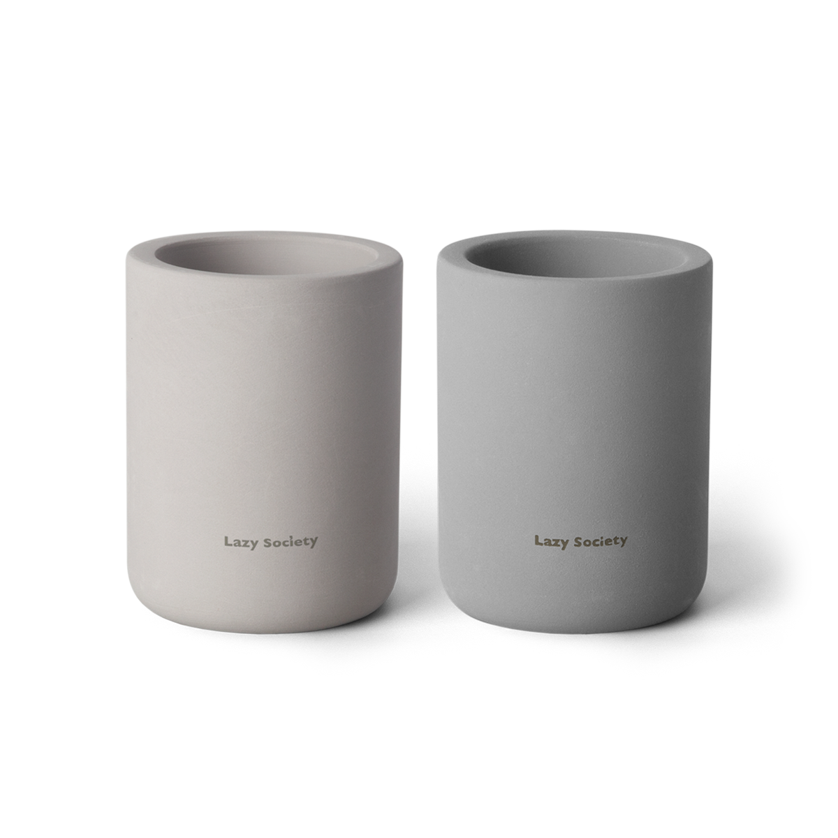 LAZY SOCIETY Diatomaceous Earth Holder 2.0 : deux supports en céramique sur fond noir, logo Lazy Society visible.