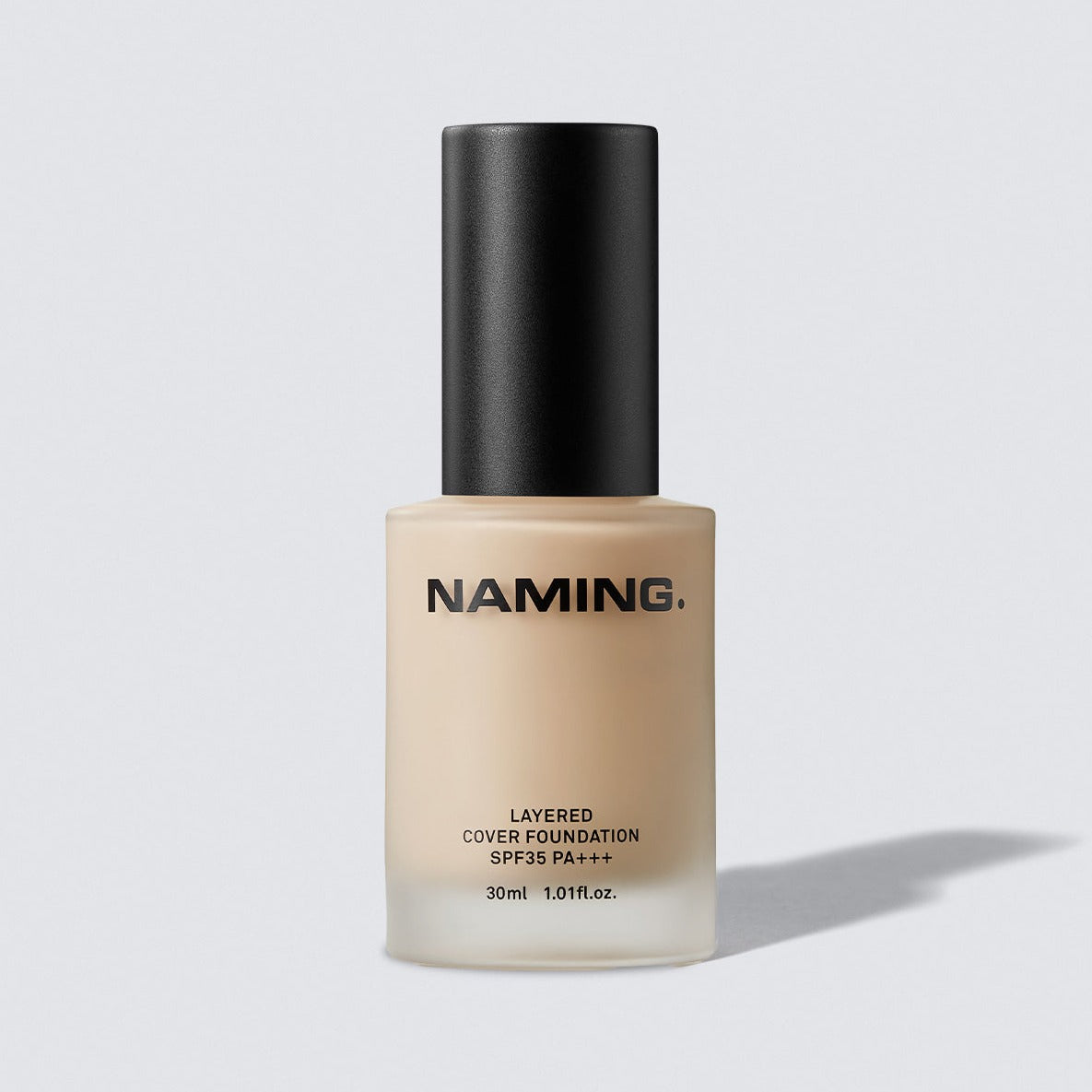 NAMING Layered Cover Foundation 30ml de la marque NAMING, flacon beige sur fond clair studio.