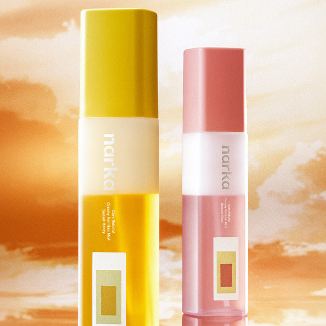NARKA Creamy Veil Hair Mist, brume capillaire de la marque NARKA, flacons rose et jaune sur fond coucher de soleil