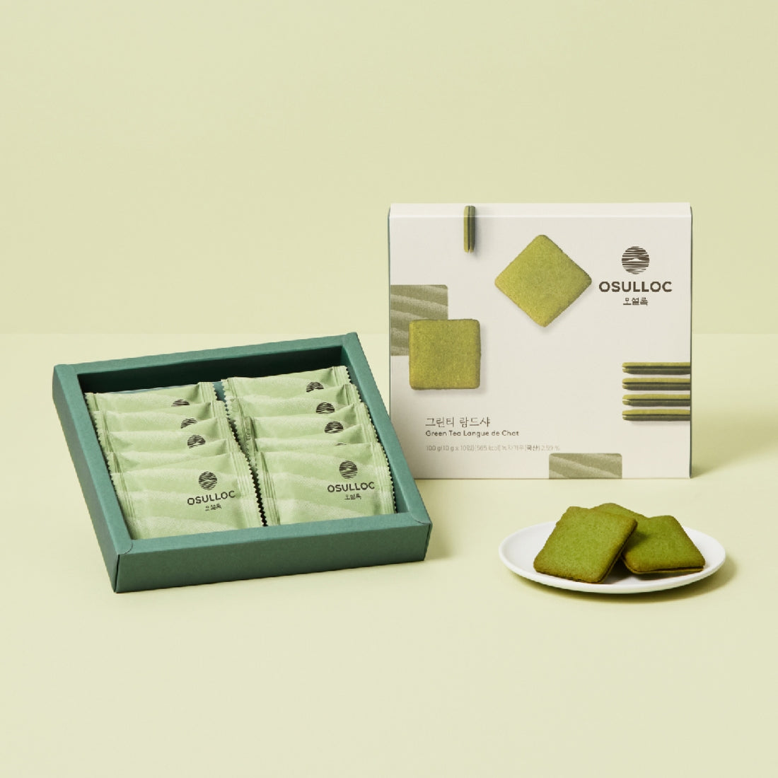 OSULLOC Green Tea Langue de chat 10 p : boîte et sachets vert menthe, langues de chat sur assiette, fond clair
