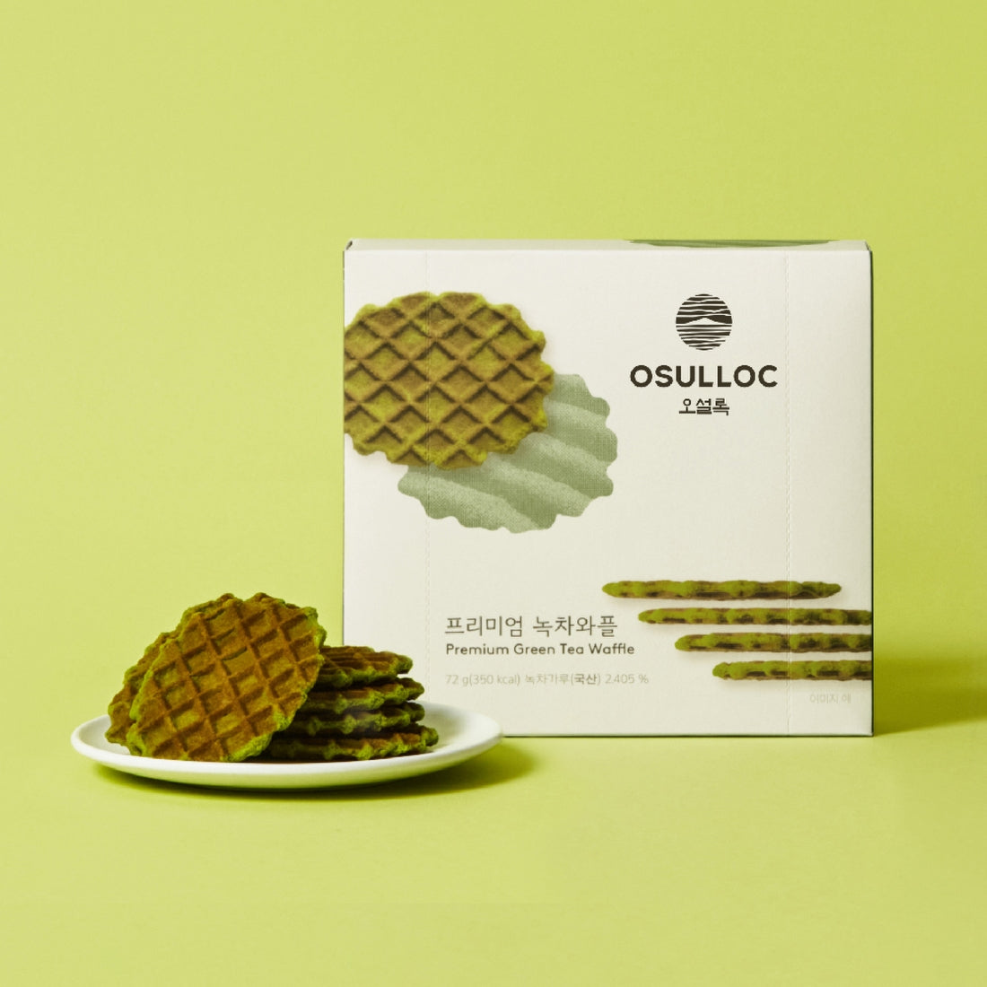 OSULLOC Premium Green Tea Waffle 72g : gaufres vertes sur assiette, boîte OSULLOC sur fond vert, style produit.