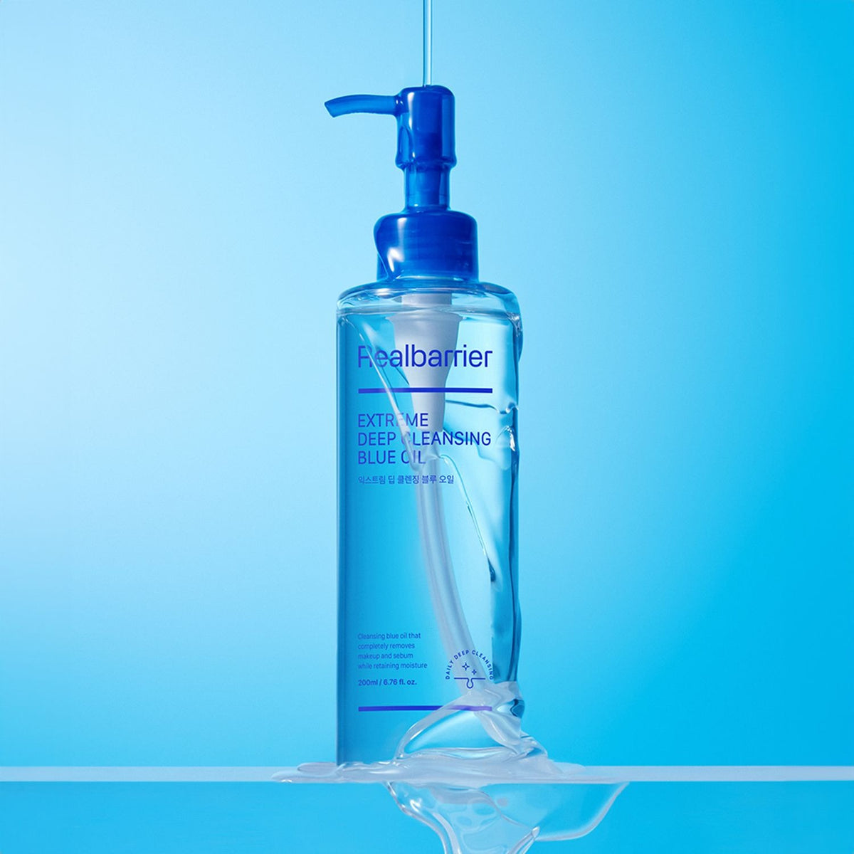 REAL BARRIER Extreme Deep Cleansing Blue Oil 200ml, flacon bleu sur fond clair bleu, marque Real Barrier en contexte visuel.