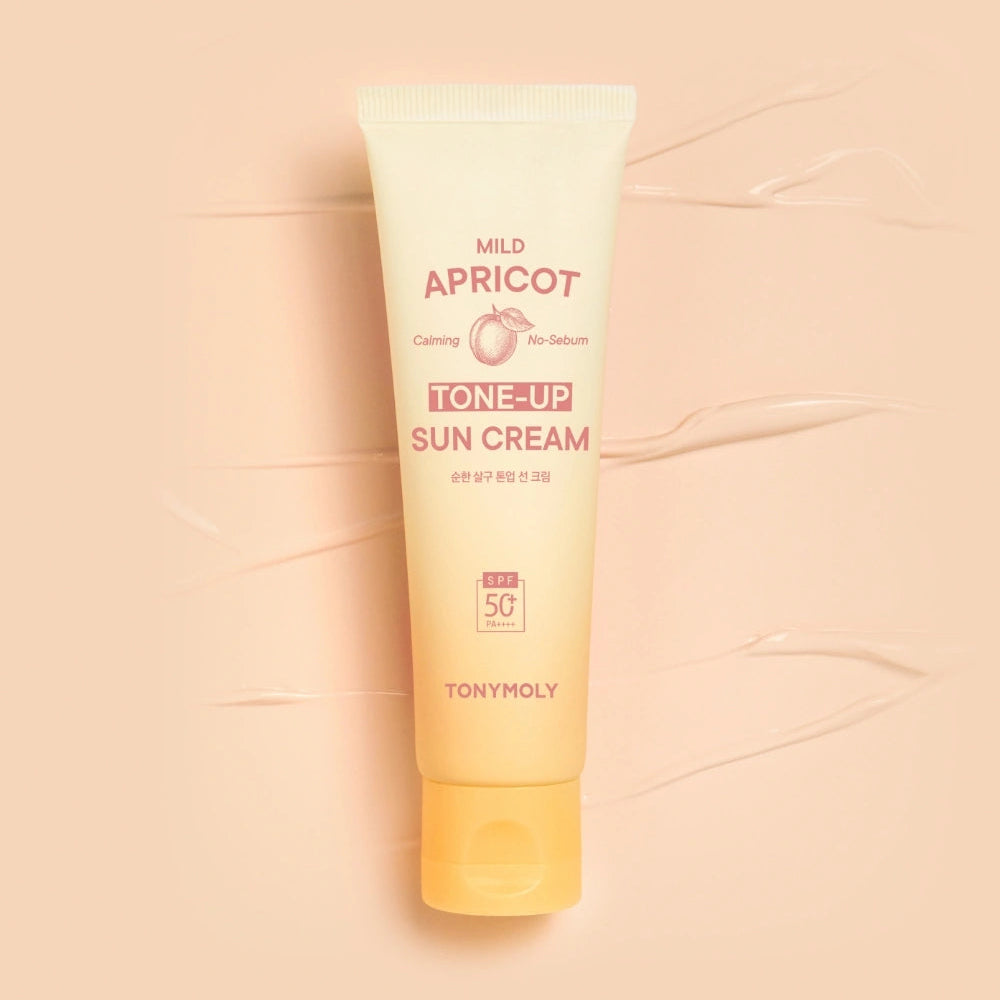 TONY MOLY Mild Apricot Tone-Up Sunscreen sur fond crème, tube et marquage TONY MOLY visibles, ambiance skincare.