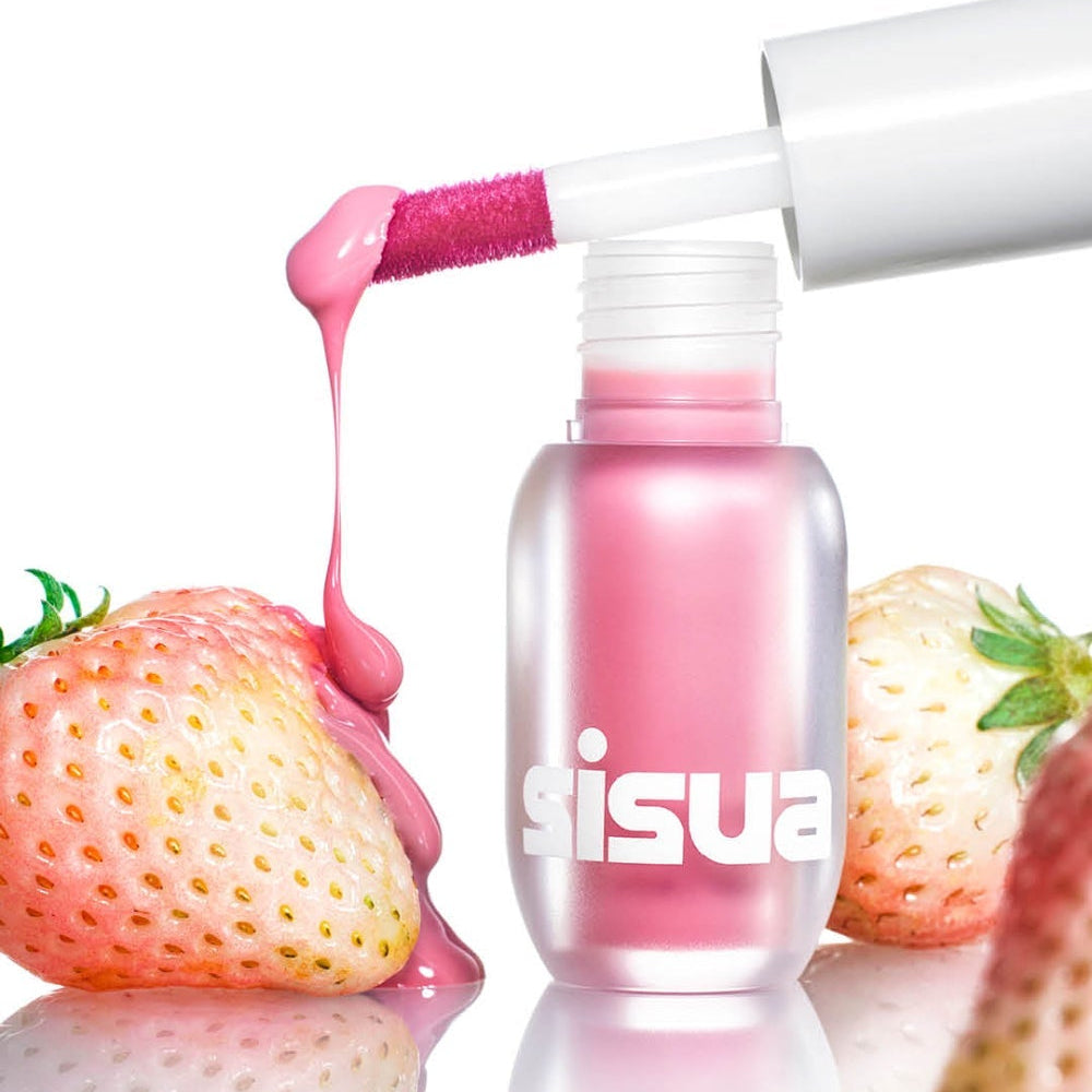 UNLEASHIA Sisua Berry Shot Lip Tint de la marque UNLEASHIA, flacon avec texture rosée, fraises et éclat visuel.