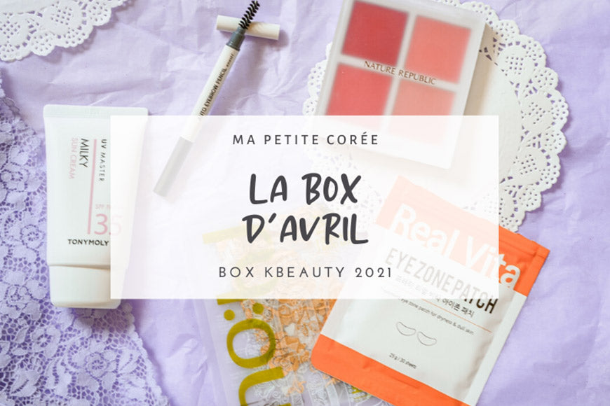 Produits de LA KBEAUTY BOX D'AVRIL 2021, incluant soins et maquillage sur fond violet.