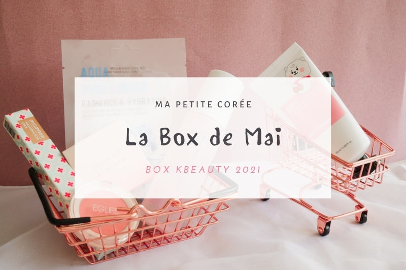 Produits de la KBeauty Box Mai 2021 par Ma Petite Corée exposés dans des mini chariots roses.