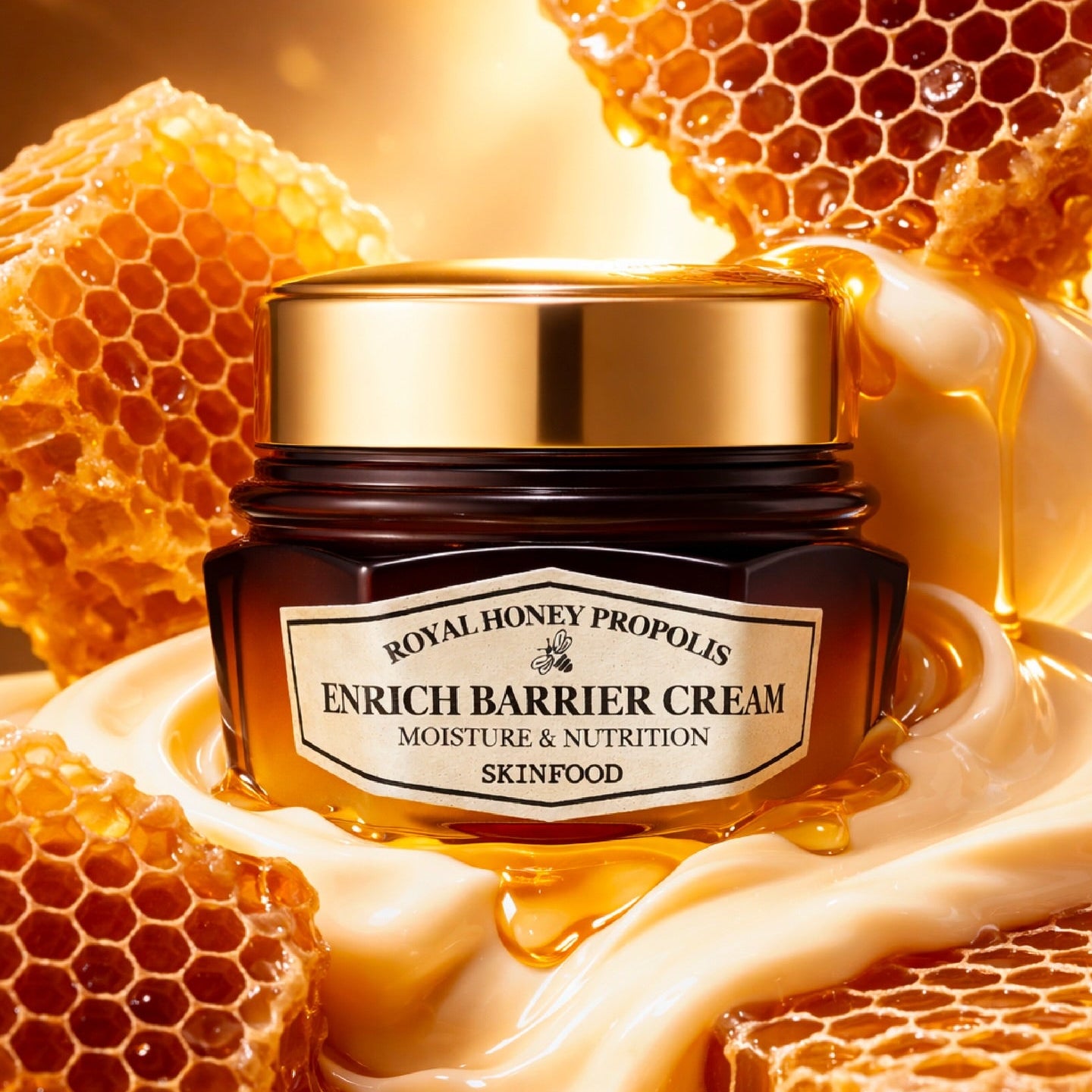 SKINFOOD Royal Honey Propolis Enrich Barrier Cream 63ml : pot et miel royal, cire d’abeille fond doré, visuel beauté.