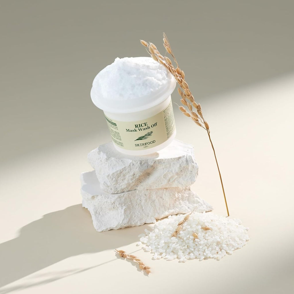 SKINFOOD Rice Mask Wash Off 120g de la marque SKINFOOD : pot crème blanche et riz, sur fond beige.