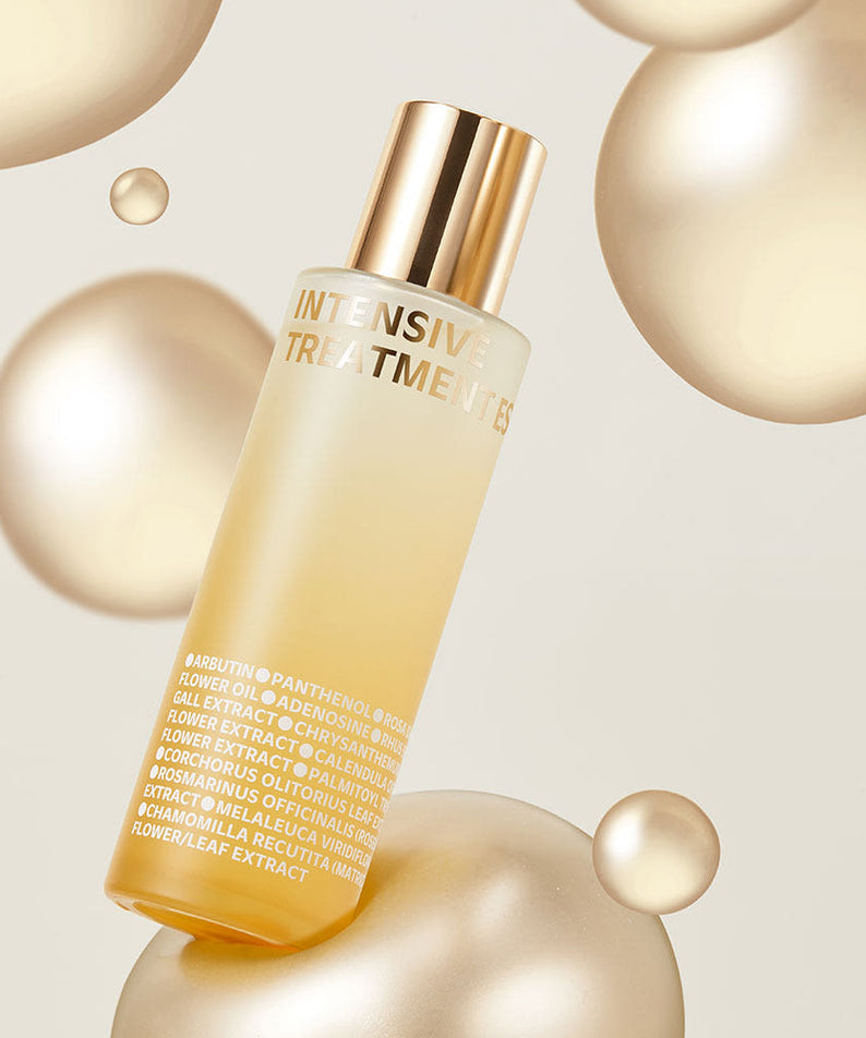 ISOI Intensive Treatment Essence 130ml avec bulles dorées flottantes, flacon de soin pour peaux lumineuses.