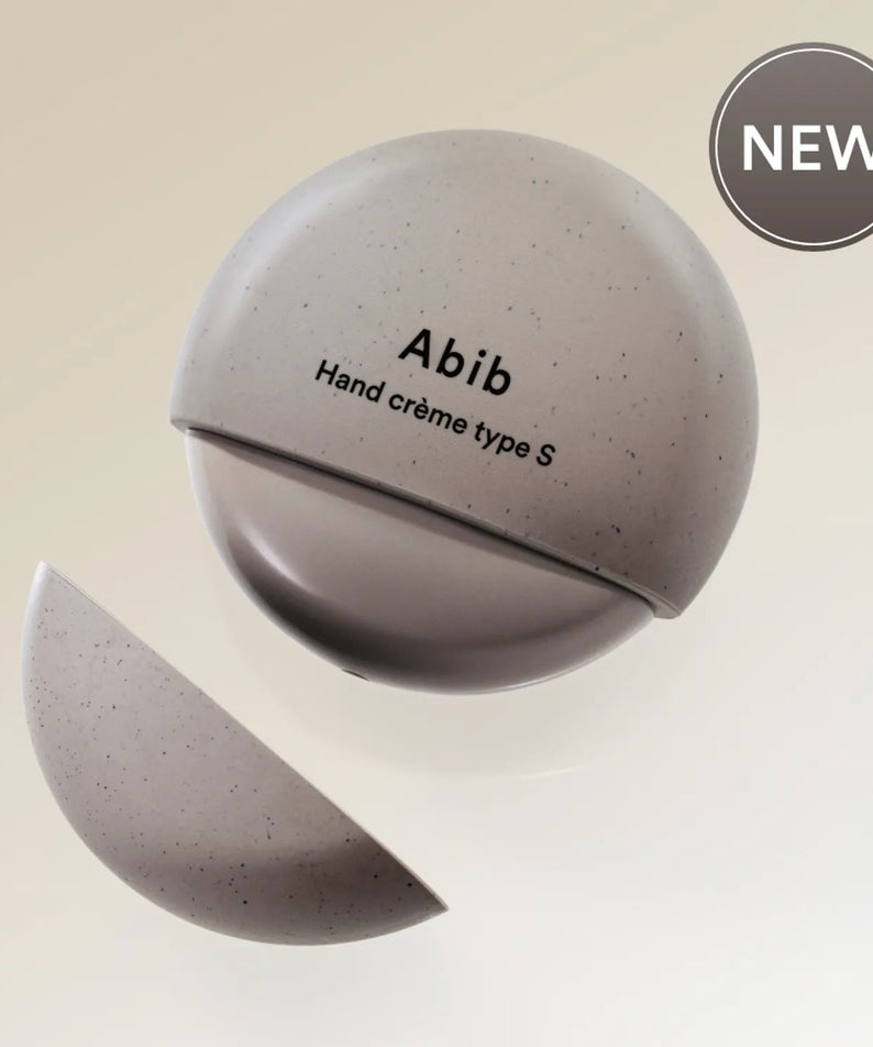 ABIB Hand Cream Type 50ml, crème pour les mains Abib, présentée en sphère, pack cosmétique NEW sur fond beige.