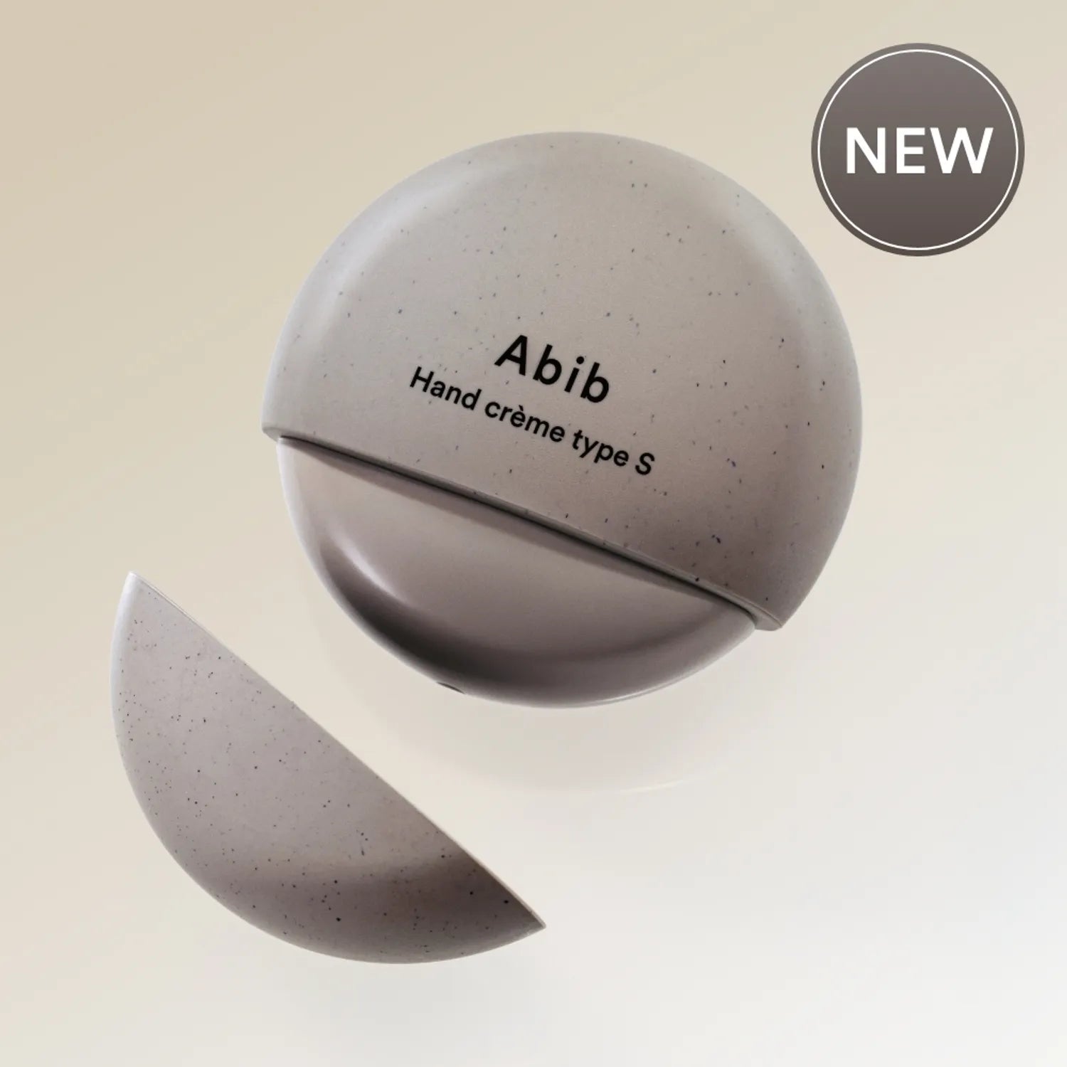 ABIB Hand Cream Type 50ml, crème pour les mains Abib, présentée en sphère, pack cosmétique NEW sur fond beige.