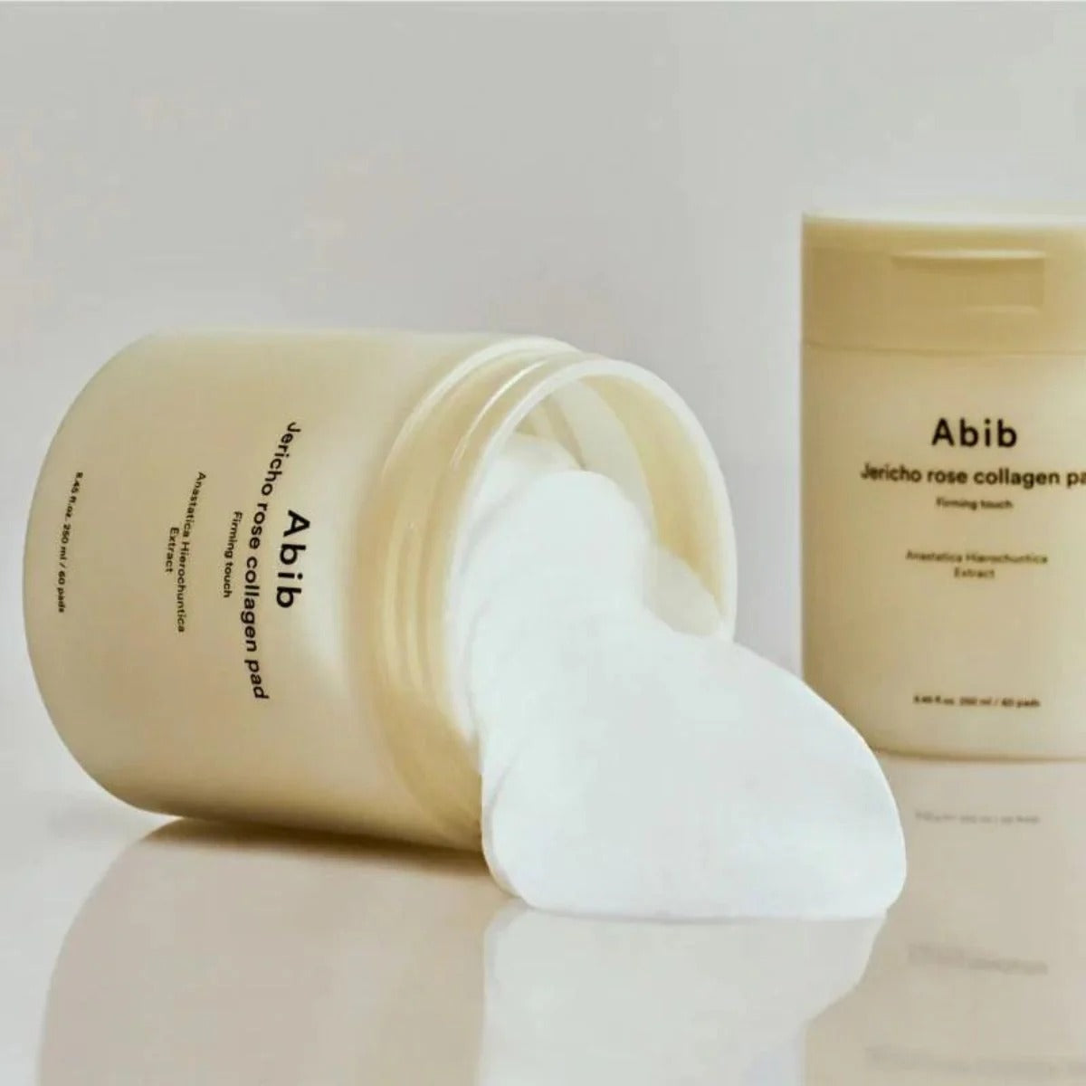 ABIB Jericho Rose Collagen Pad Firming Touch 60 Pads, coussins visage à la rose, boîte Abib sur fond clair