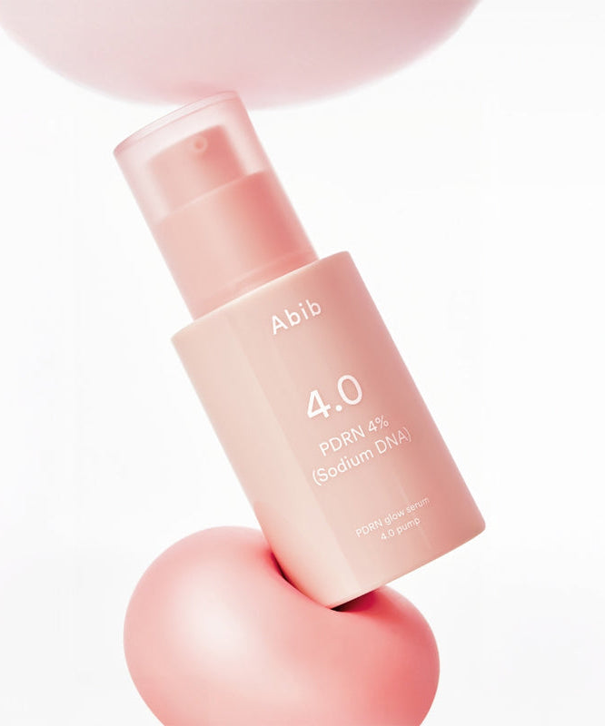 ABIB  PDRN Glow Serum 30ml, flacon rose ABIB sur fond clair, contexte beauté/skincare en gros plan.