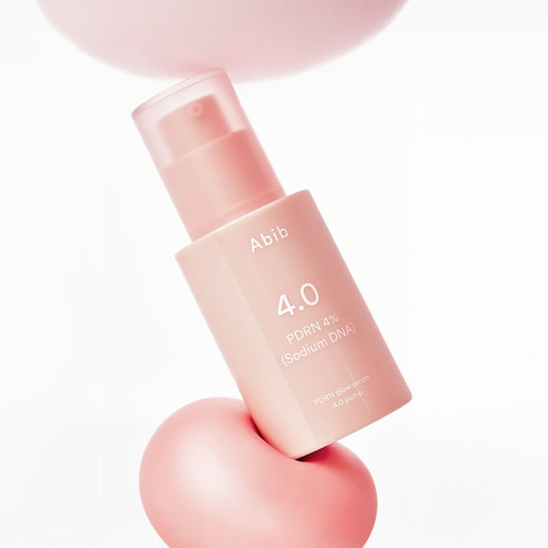 ABIB  PDRN Glow Serum 30ml, flacon rose ABIB sur fond clair, contexte beauté/skincare en gros plan.