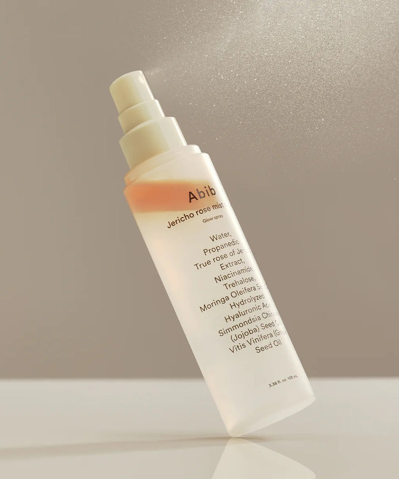 ABIB Jericho Rose Mist Serum Glow Spray 100ml, brume hydratante pour une peau éclatante, bouteille de 100ml en lumière douce.