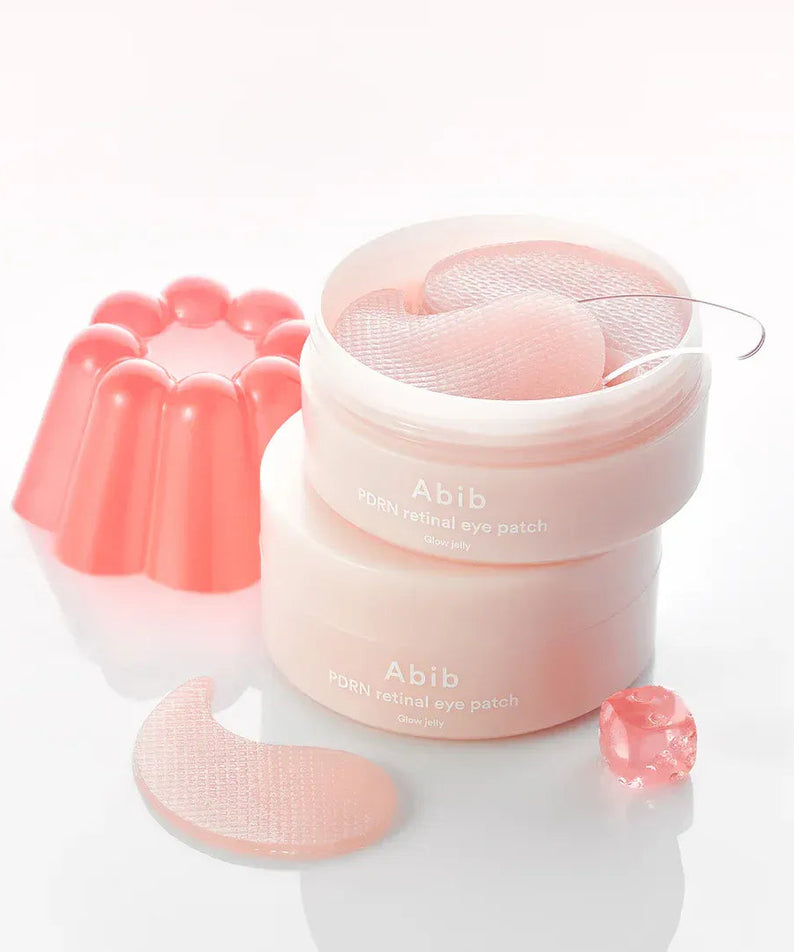 ABIB PDRN Retinol Eye Patch Glow jelly 30 Pairs - Patchs pour les yeux avec rétinol et gelée lumineuse en arrière-plan blanc.