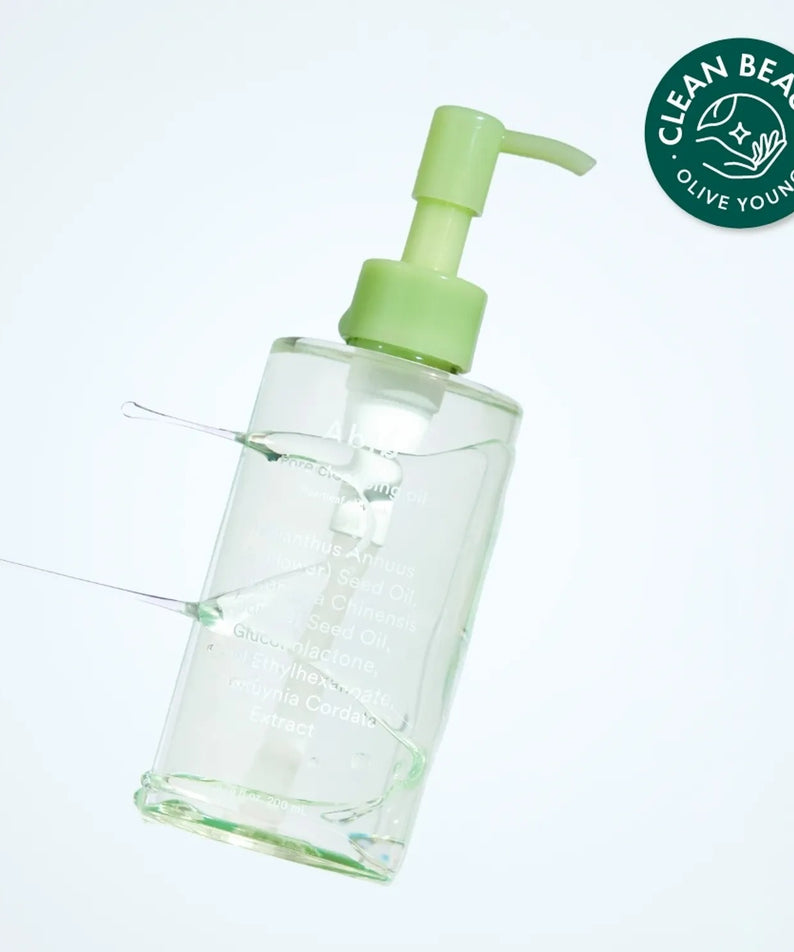 Bouteille de 200ml de ABIB Pore Cleansing Oil Heartleaf Oil-Wash avec bouchon vert, promouvant la beauté propre sur fond blanc.