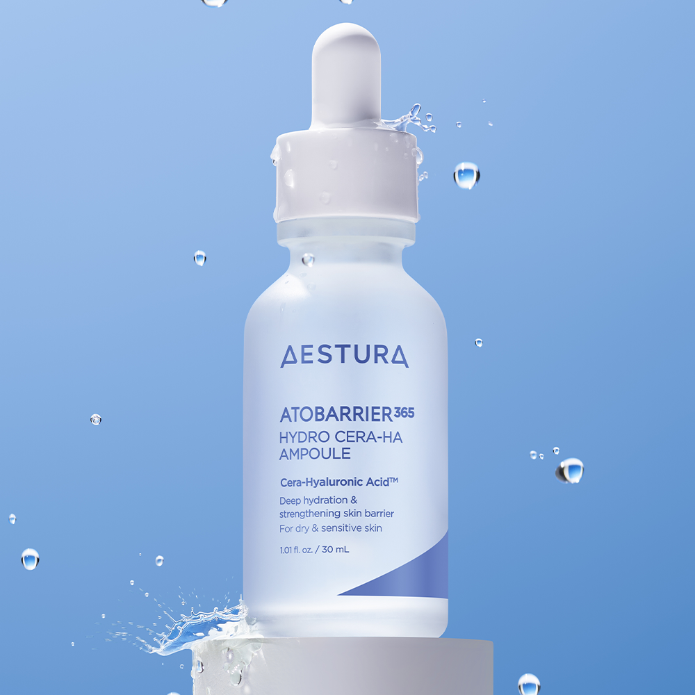 AESTURA  Atobarrier 365 Hydro Cera-HA  Ampoule 30ml : flacon blanc avec gouttes d’eau sur fond bleu, produit skincare