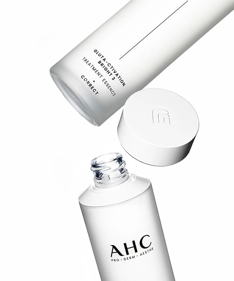 AHC Gluta Activation Bright 3 Treatment Essence 130ml, bouteille crème blanche sur fond clair, marque AHC, effet lumineux