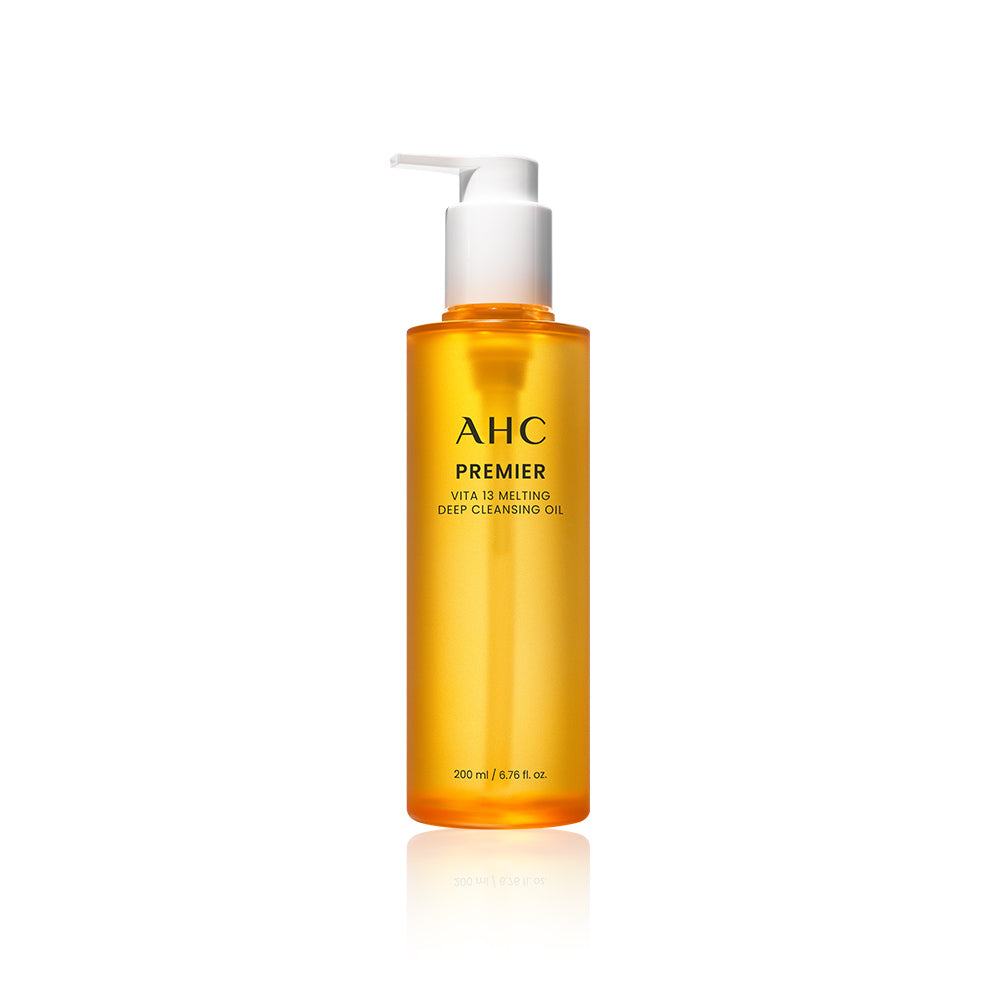 AHC Premier Vita 13 Melting Cleansing Oil 200ml, flacon pompe orange sur fond blanc, présentation produit AHC.