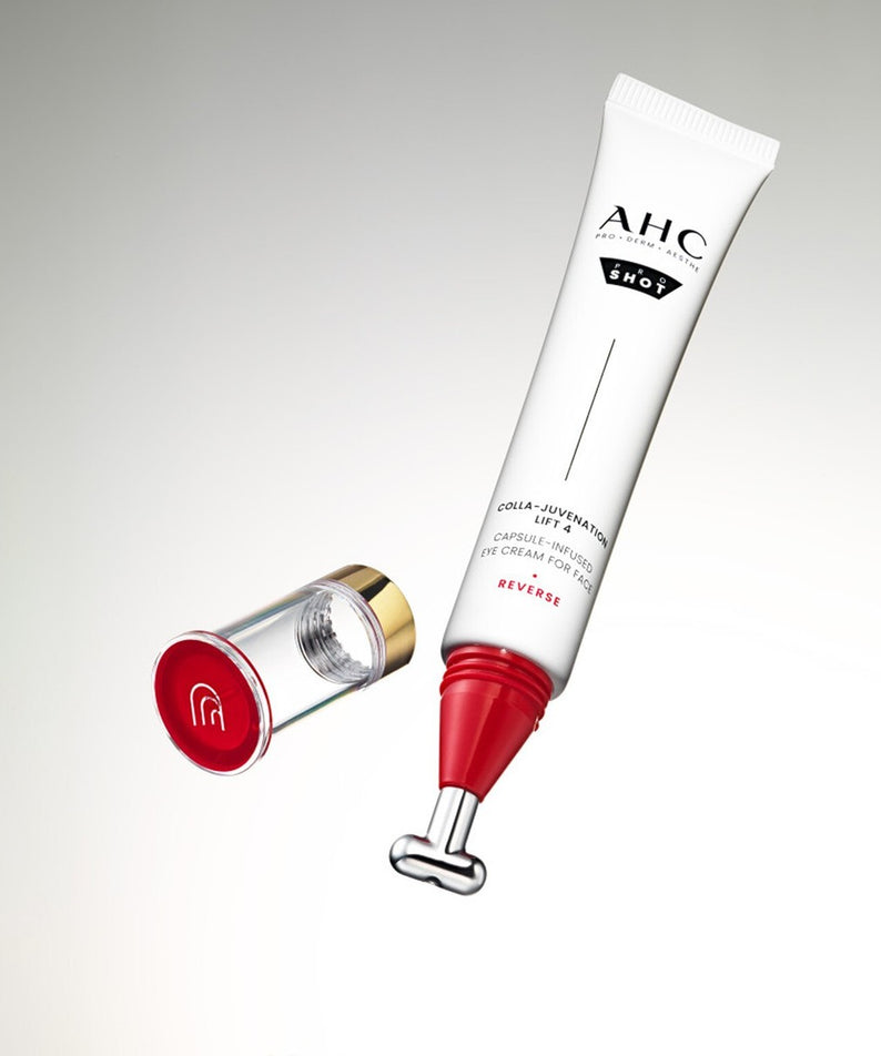 Décris l'image en français : AHC Proshot Collagen Juvenion Lift 4 Capsule Infused Eye Cream for Face 30ml, tube AHC sur fond clair.