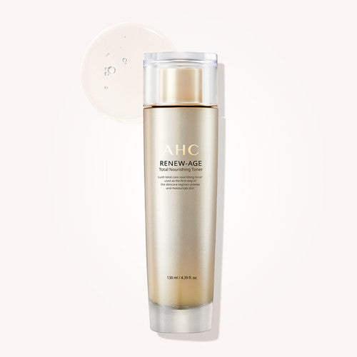 Décris l'image en français: AHC Renew Age Total Nourishing Toner 130ml AHC, flacon doré sur fond clair, produit cosmétique.