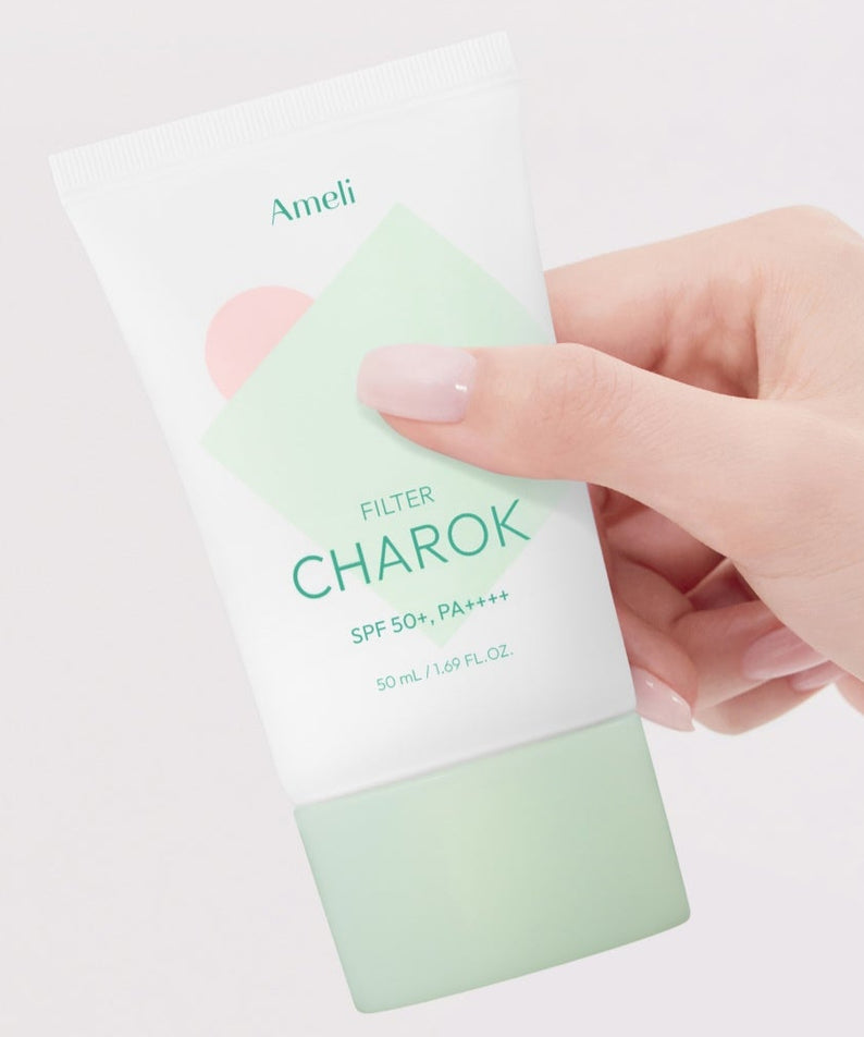 AMELI Complement Series Charok Filter 50ml tenue en main, tube de 50ml de crème solaire avec protection SPF par Ameli, Cosmétique visage.