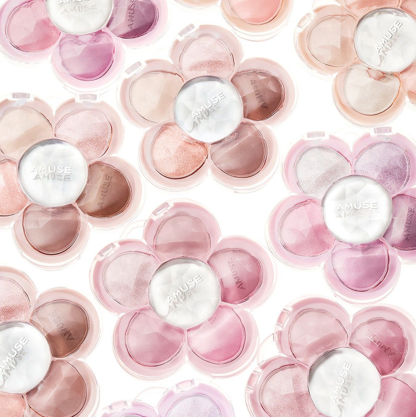 AMUSE Flora Eye Palette de AMUSE : palette d’ombres en fleurs, tons roses et champagne, photo produit sur fond clair.