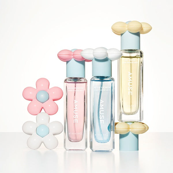 AMUSE Rose Powder Hair Perfume Mist 30ml : flacons AMUSE au décor floral pastel, sur fond blanc.
