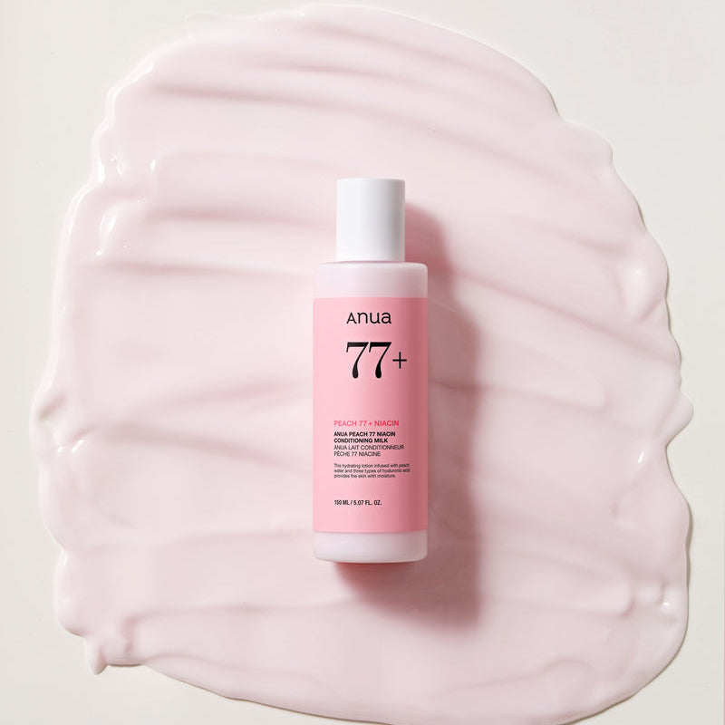 ANUA Peach 77 + Niacin Conditioning Milk 150ml de la marque ANUA, flacon sur fond crème rose, texture douce visible