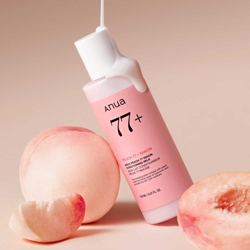 ANUA Peach 77 + Niacin Conditioning Milk 150ml, bouteille ANUA sur fond rose avec pêches, style produit beauté.