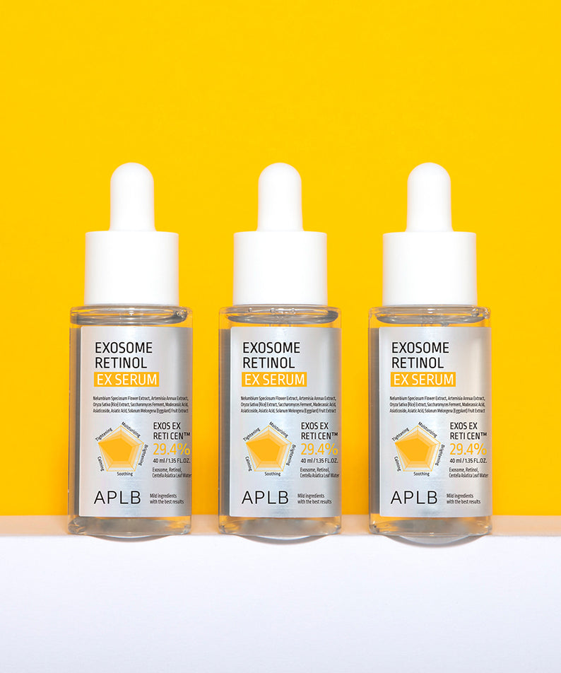 APLB Exosome Retinol EX Serum 40ml, flacons APBL sur fond jaune vif, contexte visuel studio beauté